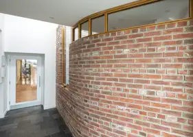 engraved-brick-wall.jpeg